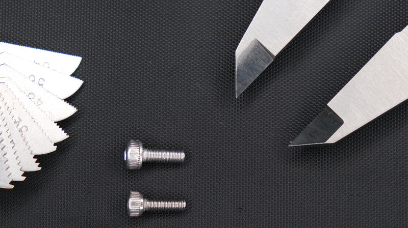 M3 and #4-40 socket head screws photographed side by side to compare their thread spacing